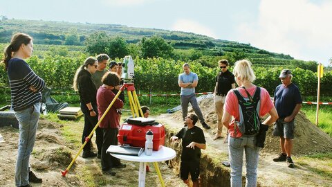 Team of archaeologists at the site in the Danube region
